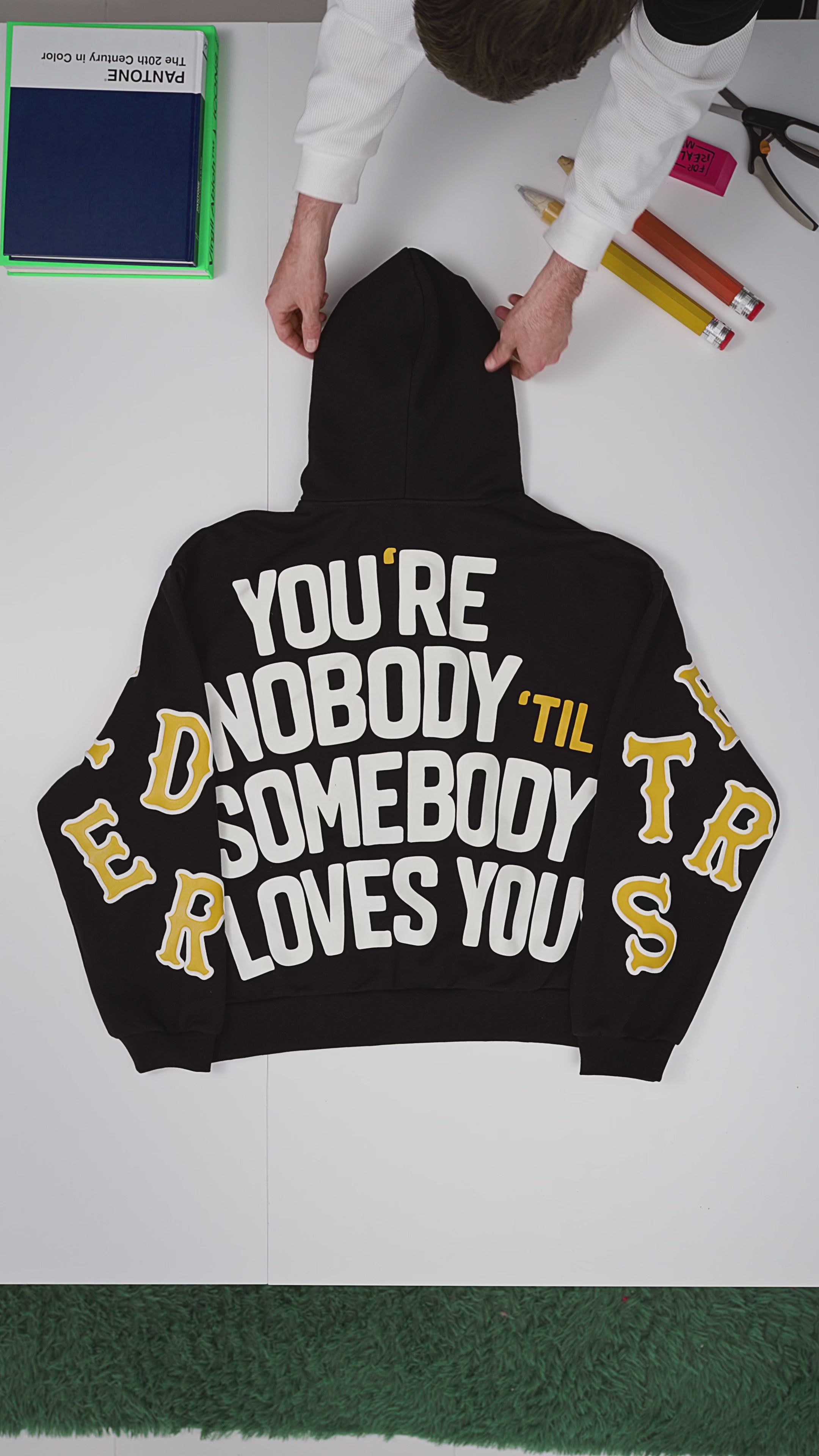 Black Somebody Hoodie — flat-lay video, back print