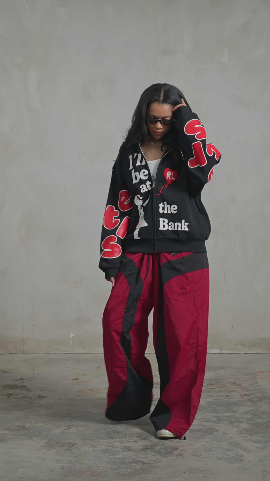 Black Bank Zip-Up Hoodie — studio fit video, front, turning