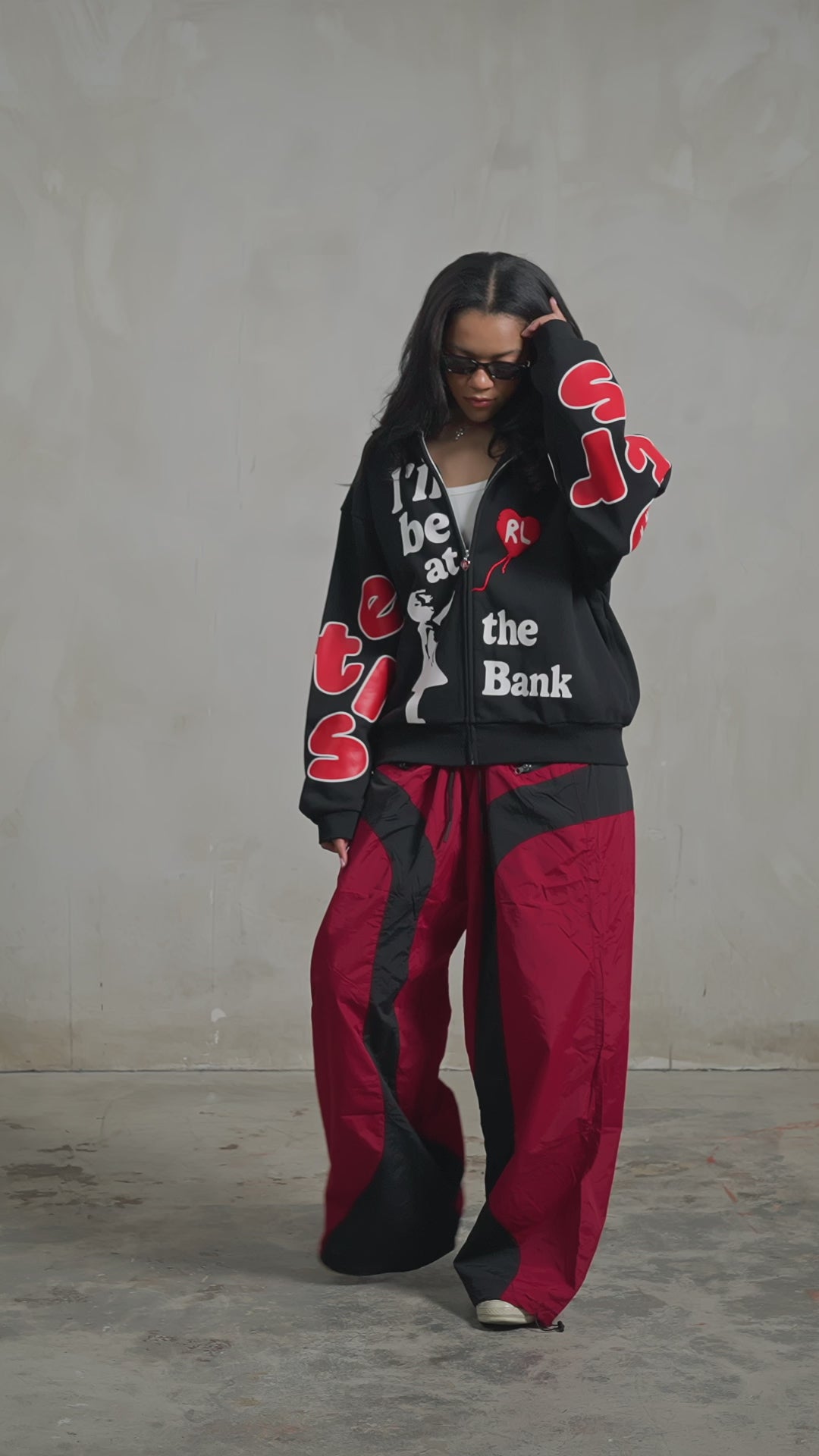 Black Bank Zip-Up Hoodie — studio fit video, front, turning