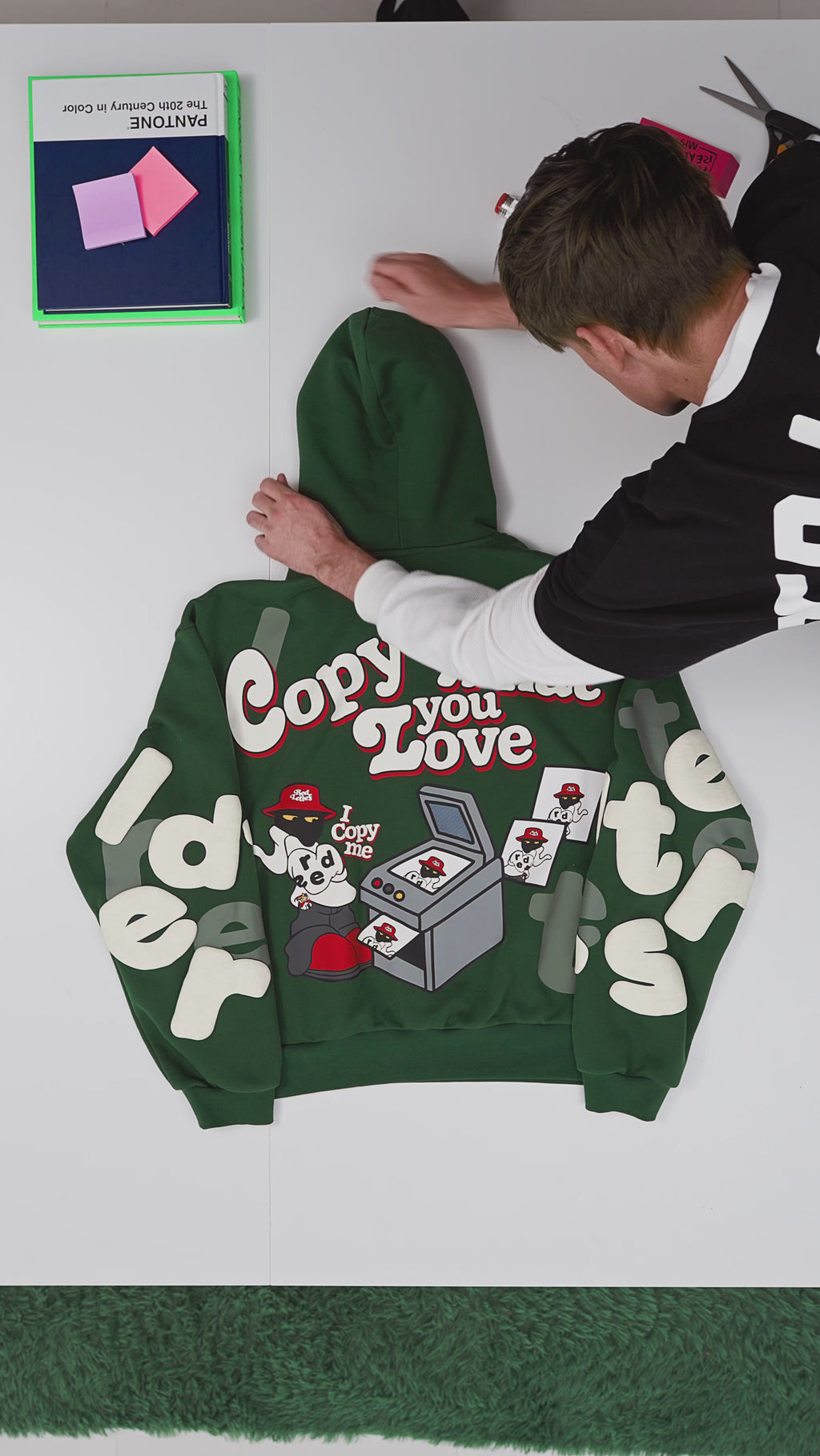 Green Letters Hoodie — flat-lay video, back print