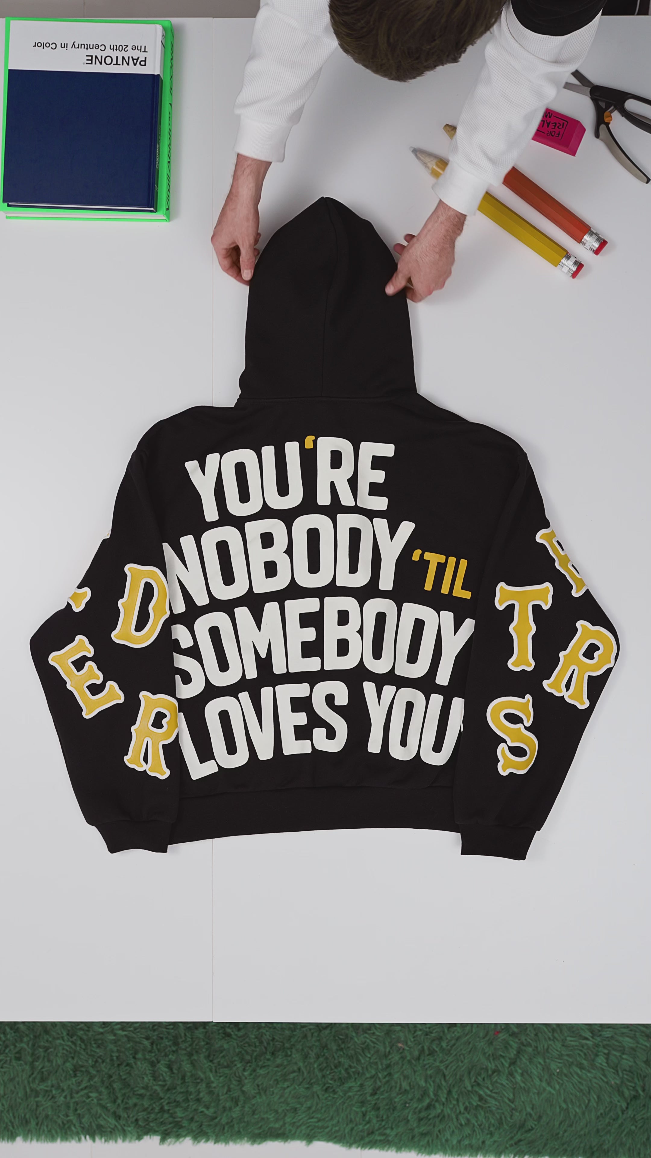 Black Somebody Hoodie — flat-lay video, back print