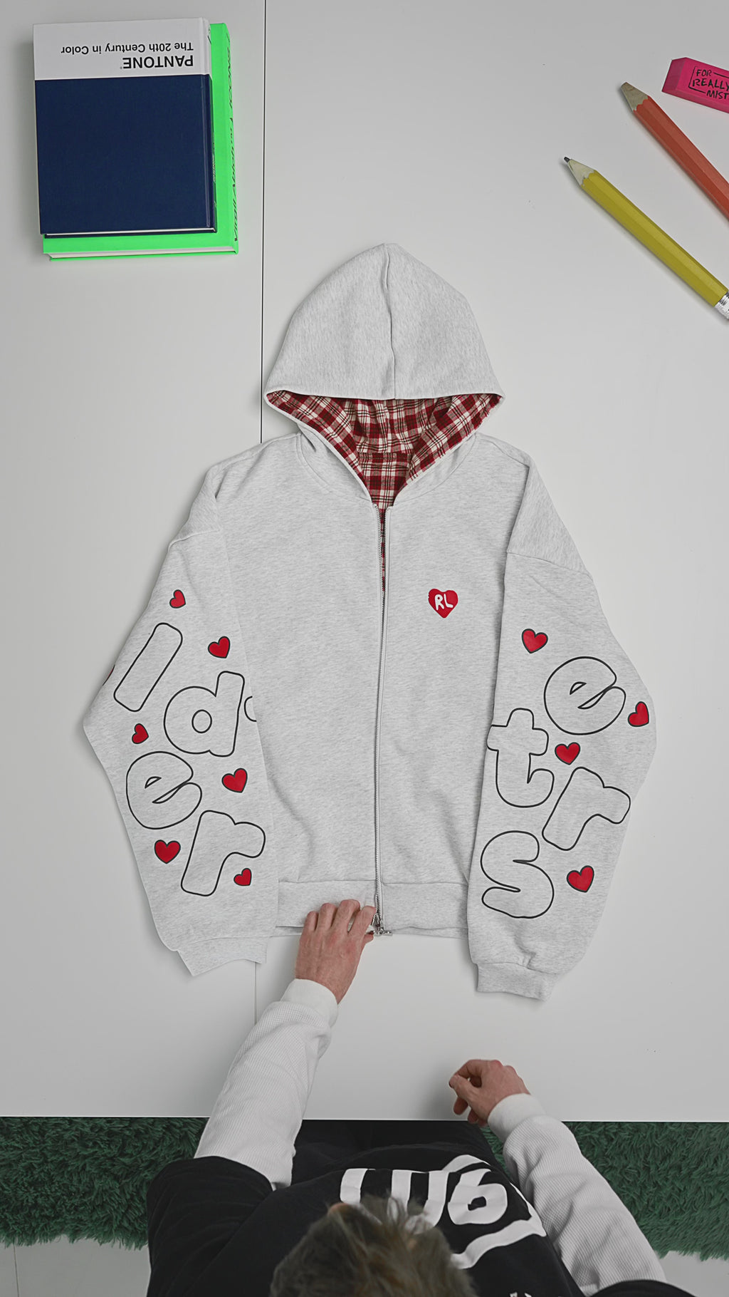 Gray Letters Zip-Up Hoodie — flat-lay video, plaid hood, red letters