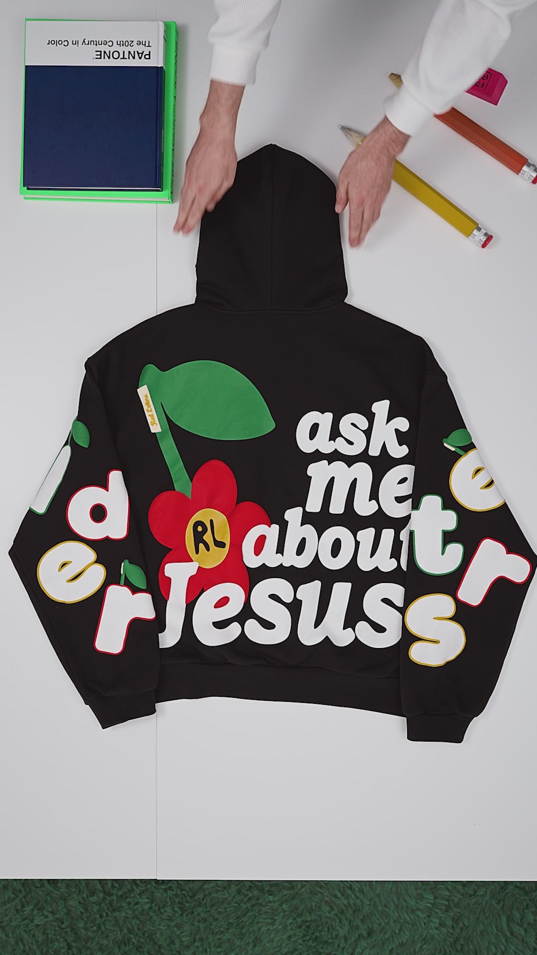 Black Ask Zip-Up Hoodie — flat-lay video, back print