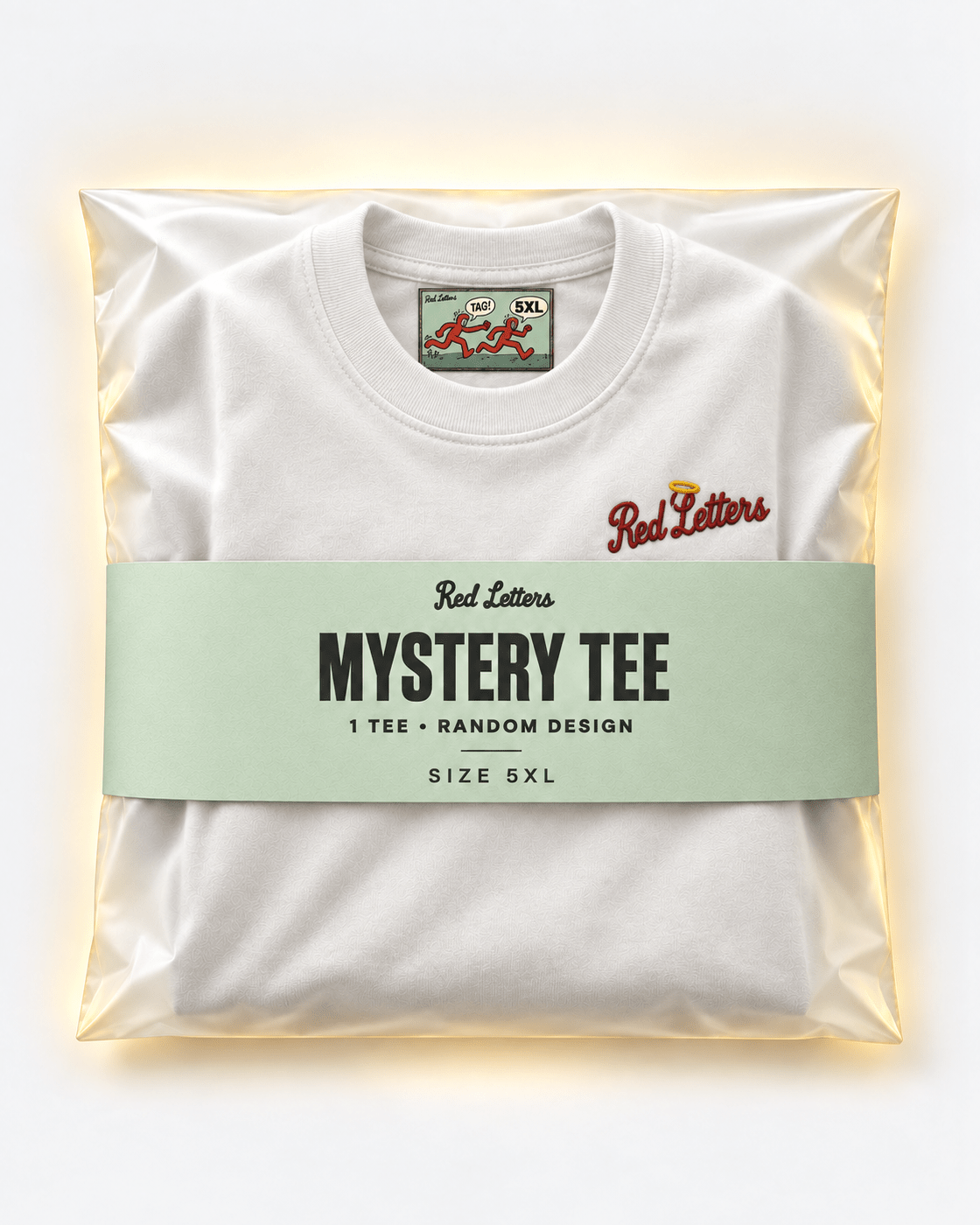 Red Letters Mystery Tee, size 5XL, with a stitched illustrated neck tag, subtle embroidered chest logo and seafoam packaging. One tee, random design.