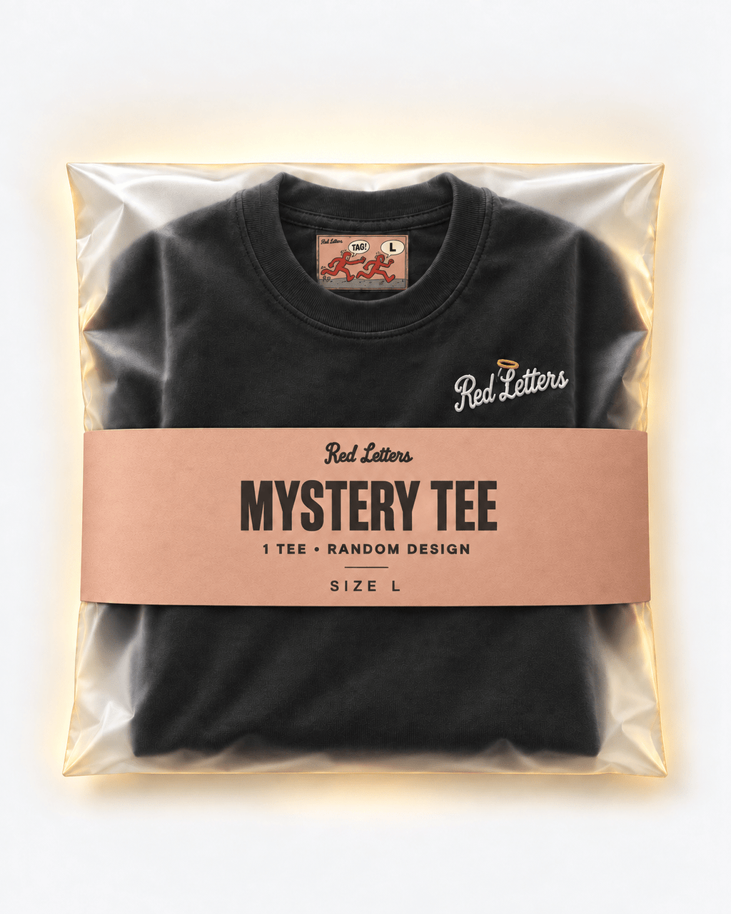 Red Letters Mystery Tee, size L, with a stitched illustrated neck tag, subtle embroidered chest logo and clay packaging. One tee, random design.